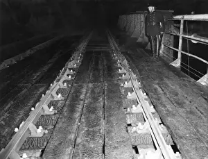 Bales Prints: Distorted rails after fire in Hackney, East London