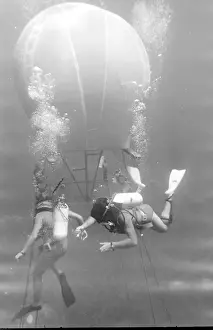 Divers with underwater house off the coast of Malta