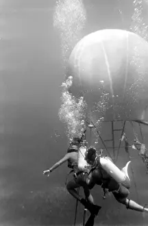Divers with underwater house off the coast of Malta