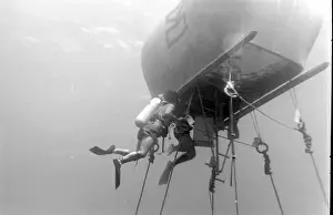 Divers with underwater house off the coast of Malta