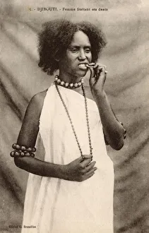 Djibouti Gallery: Djibouti, East Africa - A Young girl cleans her teeth