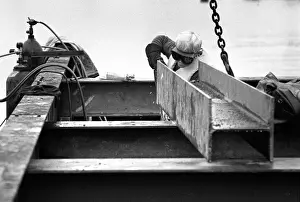 Seagulls Prints: Docklands development, London, England - a welder at work