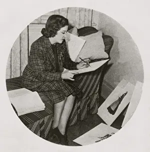 Metro Goldwyn Mayer Prints: Dolly Tree at MGM in her studio surrounded by her sketches