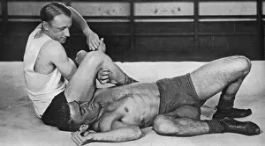 Images Dated 4th March 2011: Don Bradman wrestling