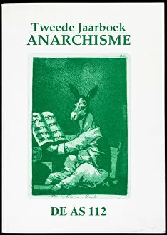 Anarchist Collection: Donkey looking at picture book