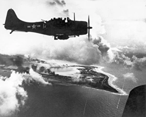 Douglas A-24 Dauntless dive bomber about to bomb Wake Island Douglas A-24 Dauntless dive bomber about to bomb Wake Island