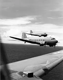 Enroute Prints: Douglas C-47s enroute from Bourgainville to Green Islan