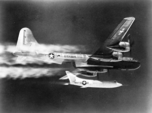 Boeing Collection: A Douglas D-558-2 Skyrocket is launched from its Boeing B-29
