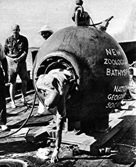 Dr. Beebe climbing out of his bathysphere, August 1934