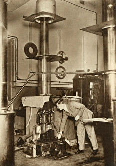 Adjusting Gallery: Dr J D Cockcroft at work in Cavendish Laboratory