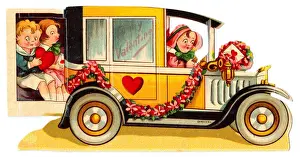 Driver and passengers in a car on a cutout Valentine card