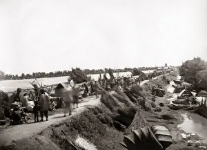Drying reeds on a riverbank, China circa 1880s