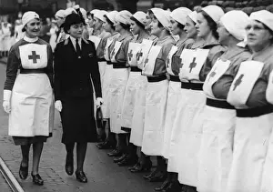 The Duchess of Gloucester inspecting nurses