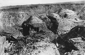 Dugouts cut into a hillside, WW1