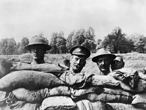 Deception Gallery: Dummy heads rising above the side of a trench, WW1