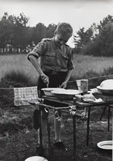 Culinary Prints: Dutch boy scout cooking at camp, Holland