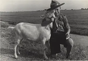 Jamboree Prints: Dutch boy scout at a jamboree with a goat
