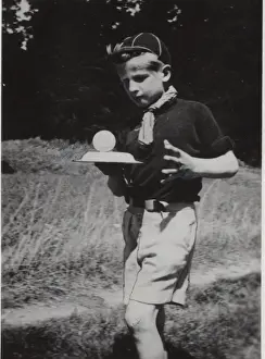 Dutch cub scout balancing a ball, Netherlands