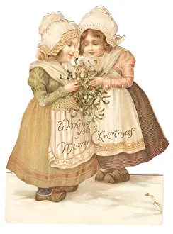 Two Dutch girls on a cutout Christmas card