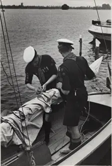 Tying Prints: Dutch sea scouts on sailing boat, Holland