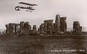 Flies Prints: An early aircraft flying over Stonehenge, Wiltshire