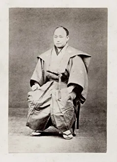 Early Japanese portrait: seated man with sword