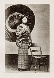 Early Japanese portrait: woman with umbrella
