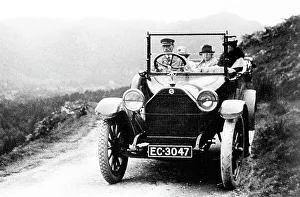Chauffeur Prints: Early motor car with chauffeur