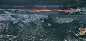 An impression of the Earth's surface during the early Precambrian period (4, 500 to 543 million years ago), by Barry Evans. Illustration shows meteorite craters in the foreground and a pool of molten rock behind Early Precambrian Earth