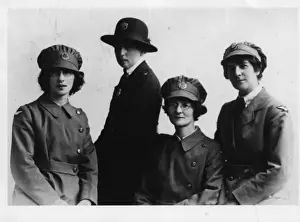 Early woman police officer with three WaFs, WW1