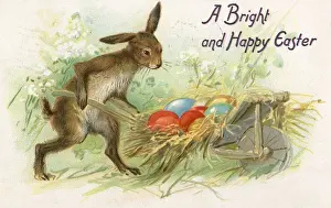 Themes Prints: The Easter Bunny brings eggs home in a wheelbarrow