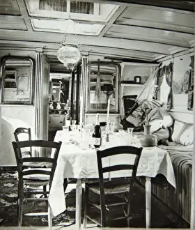 Candles Prints: Edwardian boat interior, with table and chairs