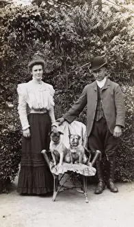 Pugs Prints: Edwardian couple with two pug dogs in a garden