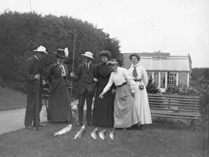 Edwardian friends inspecting a catch of fish, Pembrokeshire Edwardian friends inspecting a catch of fish, Pembrokeshire