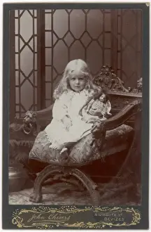 Edwardian girl with a doll