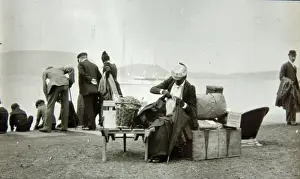 Edwardian passengers waiting to board a boat