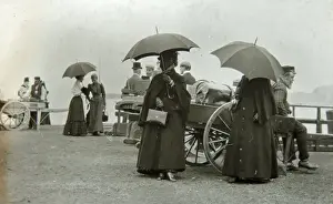 Edwardian passengers waiting to board a boat