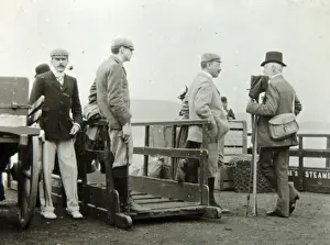 Edwardian passengers waiting to board a boat