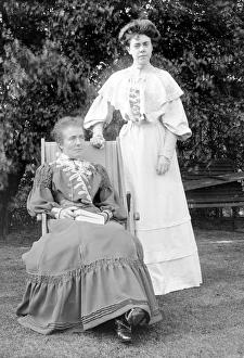 Two Edwardian women in garden Two Edwardian women in garden