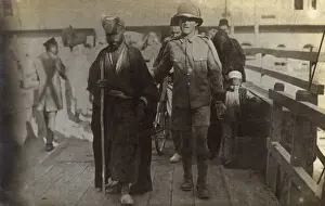 Assistance Prints: Egypt - British Soldier escorting an old blind Arab man