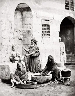 Egypt Cairo - women washing with water from a well