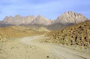 Egypt - road winds in rocks in Arabian desert