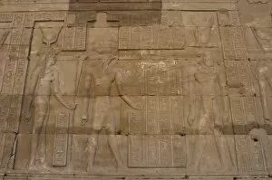 Images Dated 30th November 2003: Egypt. Temple of Horus. Relief depicting Ptolemaic pharaoh i