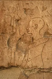 EGYPTIAN ART. Relief depicting a priest carrying the image o