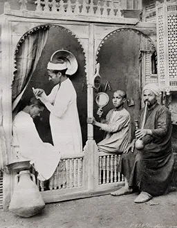 Genre Prints: Egyptian barber at work, genre studio scene, Zangaki studio