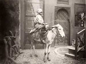 Egyptian boy on a donkey, Egypt, c. 1890