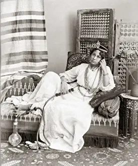 Egyptian dancer with hookah, circa 1880s