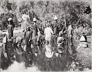 Egyptian people filling water jars, Egypt