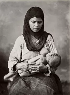 Ethnographic Collection: Egyptian woman breast-feeding a baby