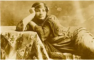Reclines Prints: An Egyptian woman reclining